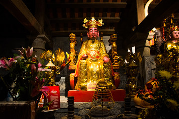 Buddhist altar of the Thai Vi Temple near Trang An Landscape Complex in summer in Tam Coc, Ninh Binh in Vietnam