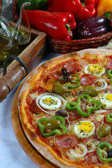 Portuguese Pizza, onion, peppers, pepperoni, egg, olive