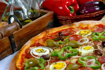 Portuguese Pizza, onion, peppers, pepperoni, egg, olive