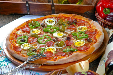 Portuguese Pizza, onion, peppers, pepperoni, egg, olive