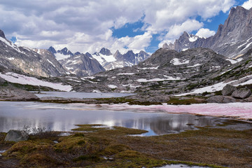 Fototapeta na wymiar Upper and Lower Jean Lake in the Titcomb Basin along the Wind River Range, Rocky Mountains, Wyoming, views from backpacking hiking trail to Titcomb Basin from Elkhart Park Trailhead going past Hobbs, 