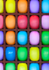 Bright multi-colored balloons in the cells.