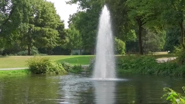 Detmold, NRW / Germany 2018-07-21: Wasserfontaine im Park der Hochschule f&uuml;r Musik 
