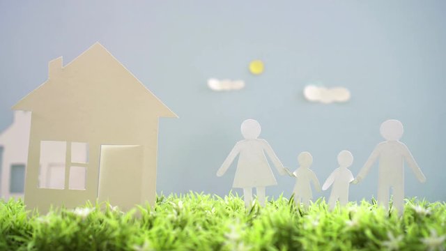 concept idea ,new home family little people out of paper
