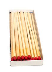 Match sticks with brown heads in stacks . Matches texture background
