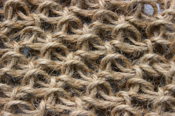 Closeup texture of coarse cloth, sacking, packing cloth, rope. Can be used as background