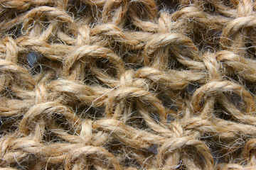 Obraz premium Closeup texture of coarse cloth, sacking, packing cloth, rope. Can be used as background