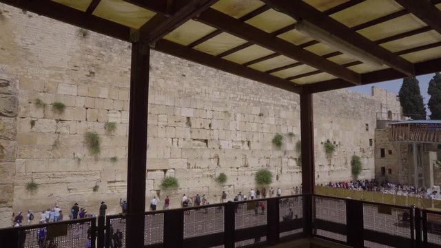 western wall, dolly out movement. beautiful perspective