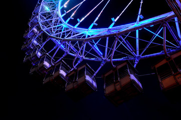 Big ferris wheel with festive blue illumination