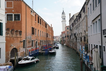 Fototapeta na wymiar Venice,Italy-July 25, 2018: San Giorgio dei Greci or leaning tower of Venice