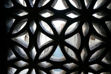 Venice,Italy-July 25, 2018: View from a stone bar window of the Bridge of Sighs in Venice
