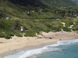 Obraz na płótnie Canvas Aerial view of People play at Makapuu beach