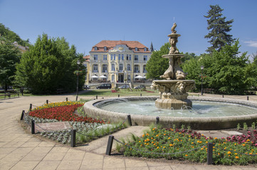 Stone spa and marble horse fountain in town Teplice v Cechach, Czech republic