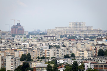 Obraz premium Bucharest seen from a high point, with the Palace of Parliament building in the background