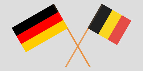 The crossed Belgium and Germany flags. Official colors. Vector
