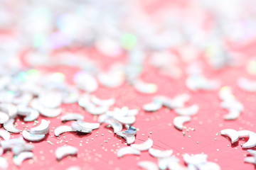 Light pink background with bokeh. 