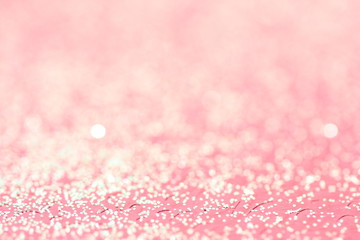 Light pink background with bokeh. 