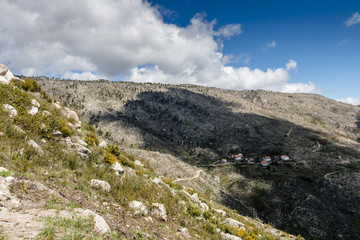Fototapeta na wymiar View of Portuguese town Covilha and district Castelo Branco. View from mountains Serra de Estrela. Summer day