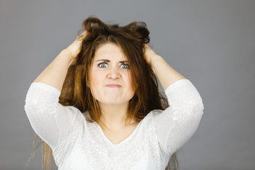 Attractive woman having angry frustrated face expression