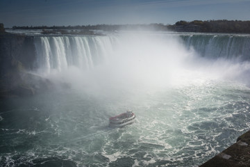 Fototapeta na wymiar Ship close to Niagara Falls waterfall