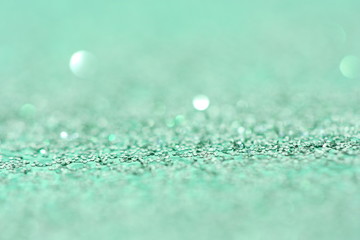 Cyan background with glitter.