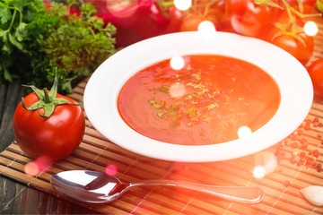 Fresh tomato soup on desk