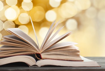 Old open Books on background