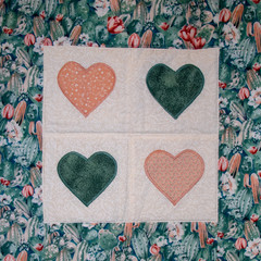 Green and peach quilt