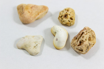 Close-up shot of multiple colorful stones that collected from beach