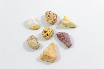 Central close-up shot of colorful multiple stones that collected from beach