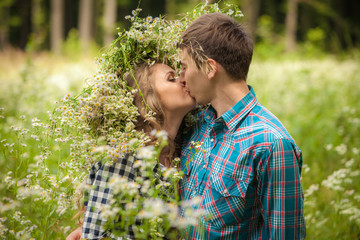 happy young couple in the woods