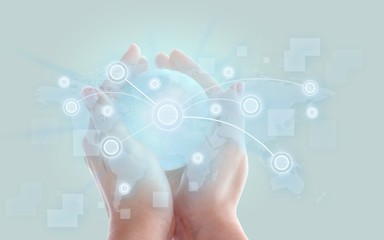 Female hands holding glass globe