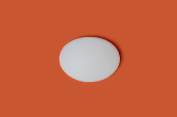 White bath soap isolated on orange background.