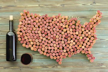 USA map of old wine corks with bottle and glass