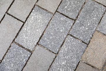 Pavement tiles, texture background. Gray Square Pavement. Seamless Tileable Texture. Old paving tiles background texture