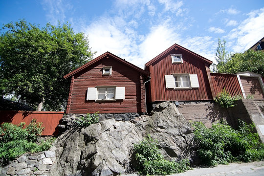 Old red wood homes in hills of Sodermalm