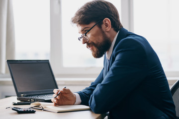 business man with glasses in the office