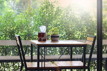 Fototapeta premium Empty Chair and tables indoor at cafe