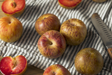 Organic Red Mottled Pluots