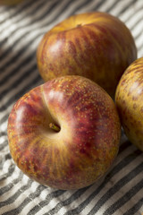 Organic Red Mottled Pluots