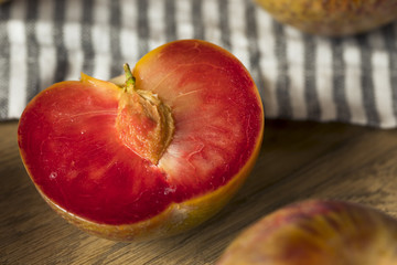 Organic Red Mottled Pluots