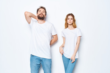 young couple in white t-shirts