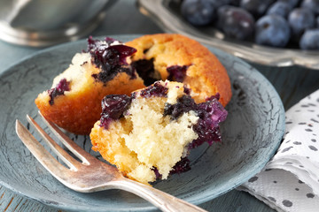 Close-up on broken tasty blueberry muffin