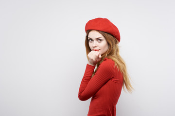 woman in red hat portrait