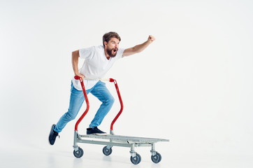Fototapeta na wymiar man riding a trolley