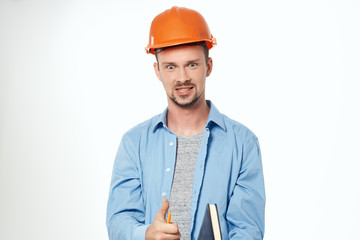 architect in an orange helmet