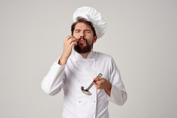 the cook is preparing to eat a ladle