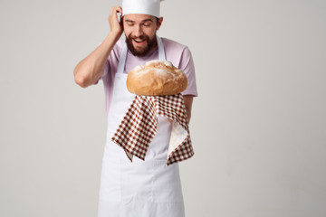 a man with a loaf bakery