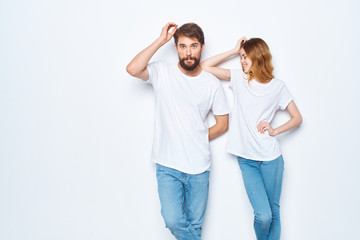young couple in white t-shirts