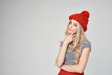 woman blonde in a red hat